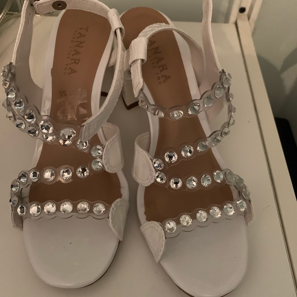White sequined pumps